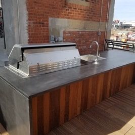 small cutout of outdoor concrete counter