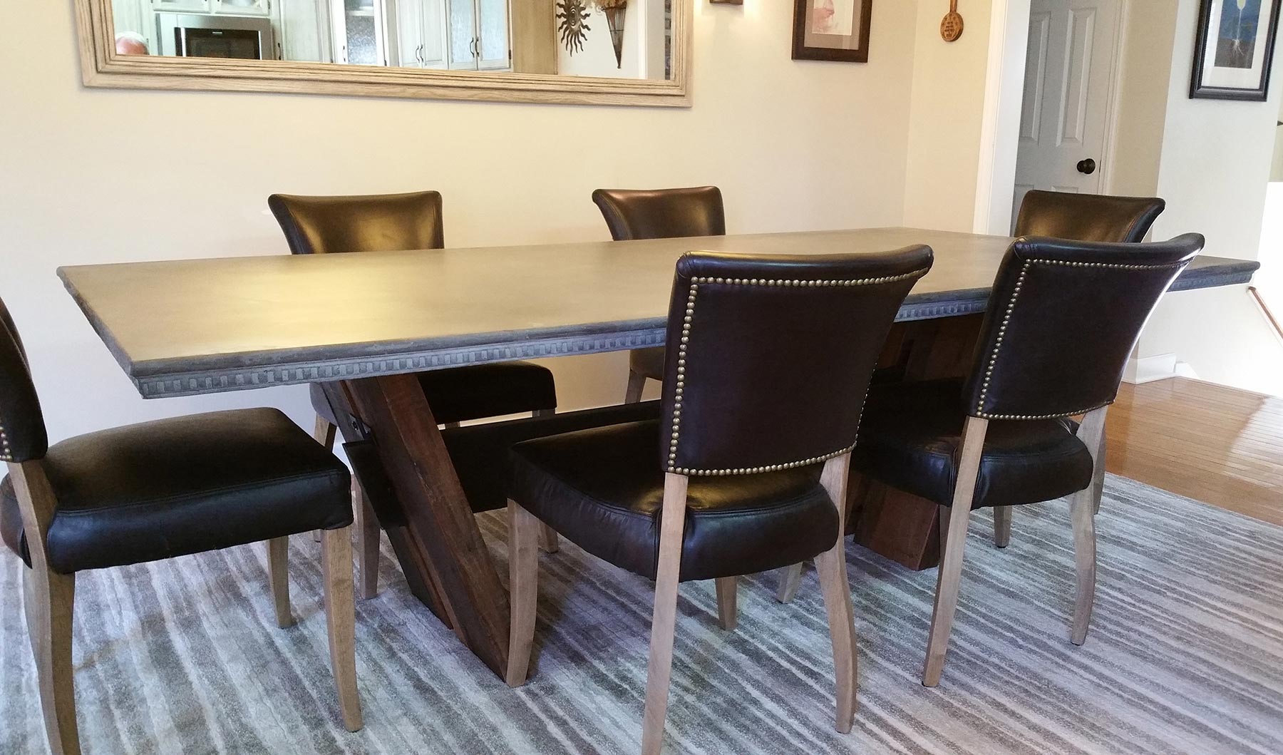 Concrete table in dining room with decorative edges