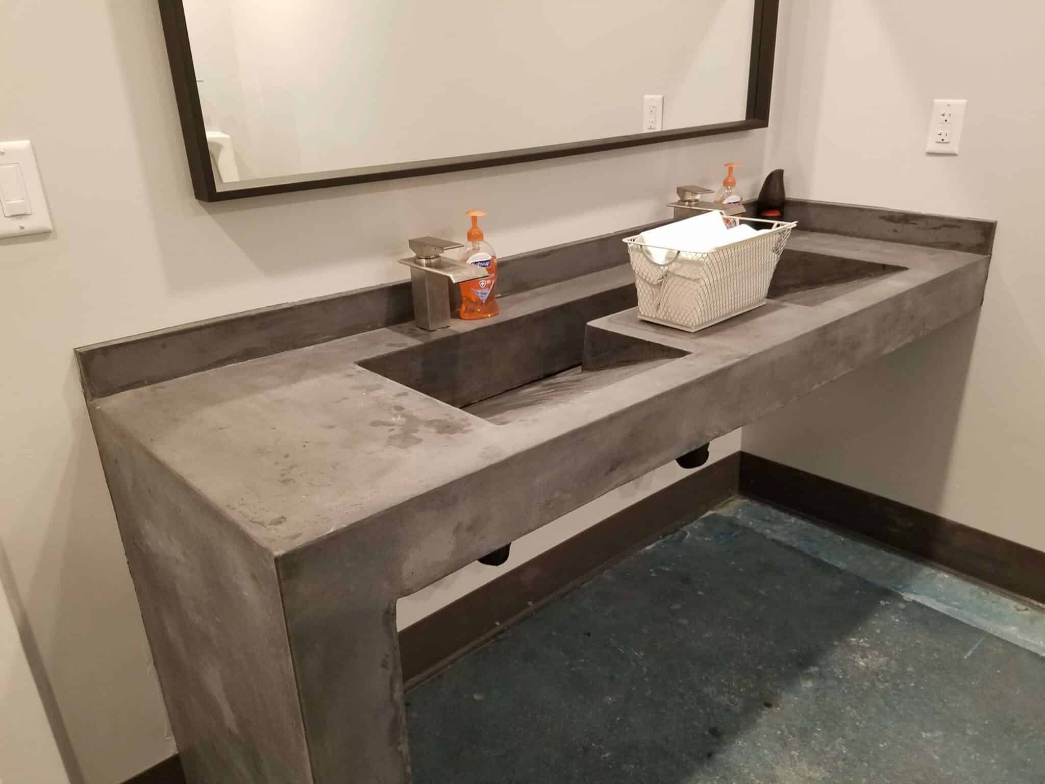 two Gordon grey slant sinks in local bathroom