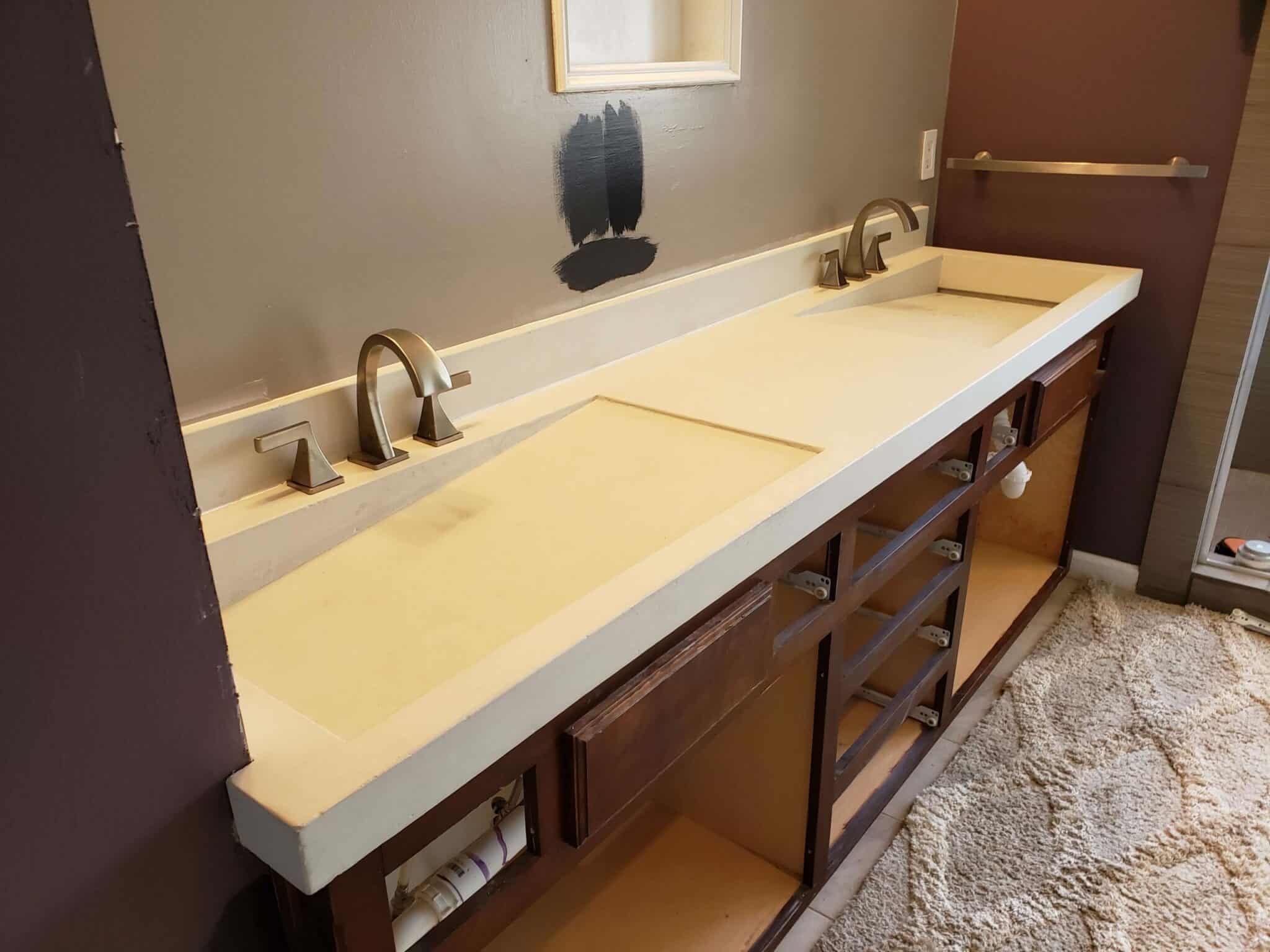 Two bone white slant sinks in new residential home