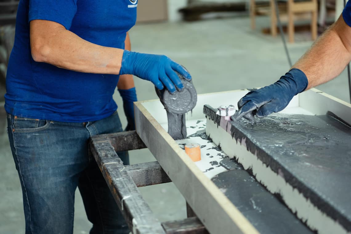 Filling a custom concrete table mold