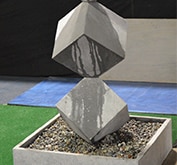 Two stacked cubes Concrete waterfall